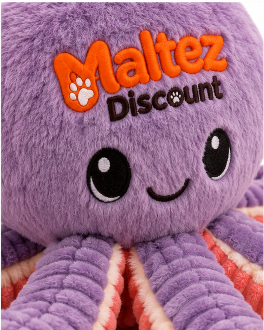 Close-up of the embroidered Maltez Discount logo and smiling face on the octopus
