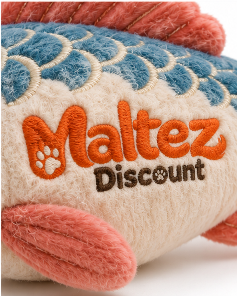 Close-up of the Maltez Discount logo embroidered into the plush fish body